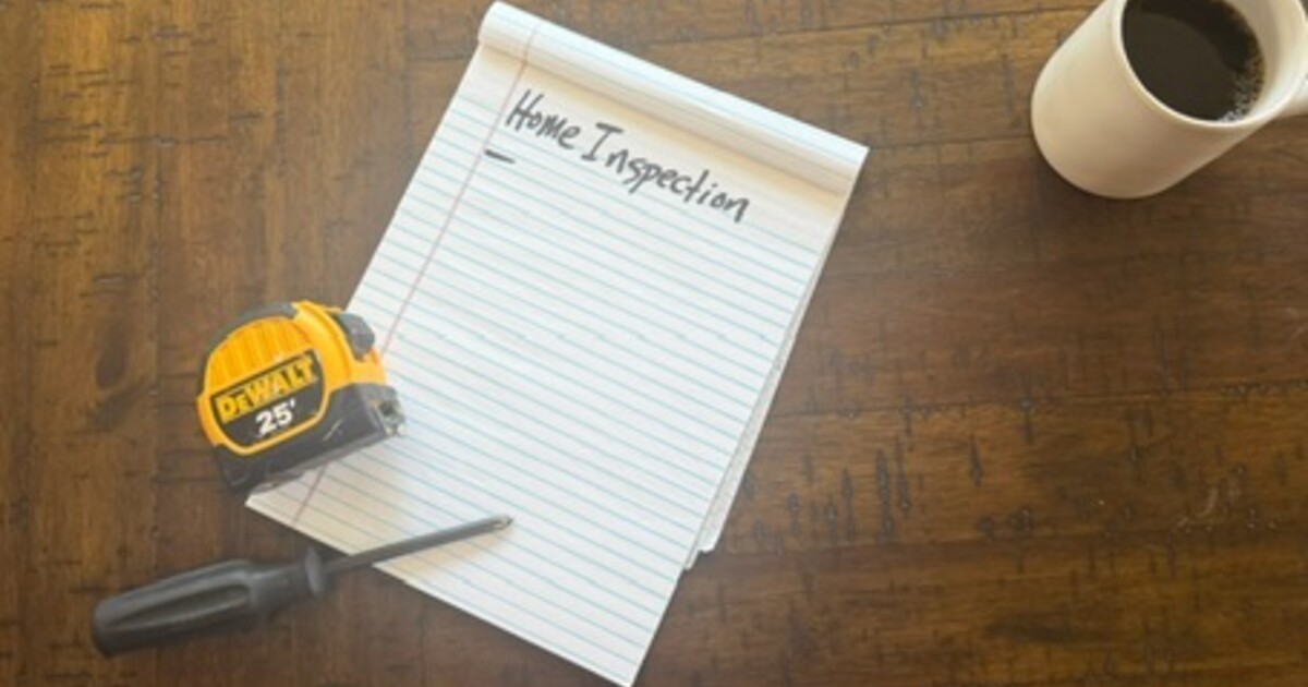 Iowa home inspector checking a property under the DMAAR Universal Purchase Agreement inspection contingency